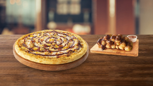 1 Pizza grande + 1 complemento en Dominos